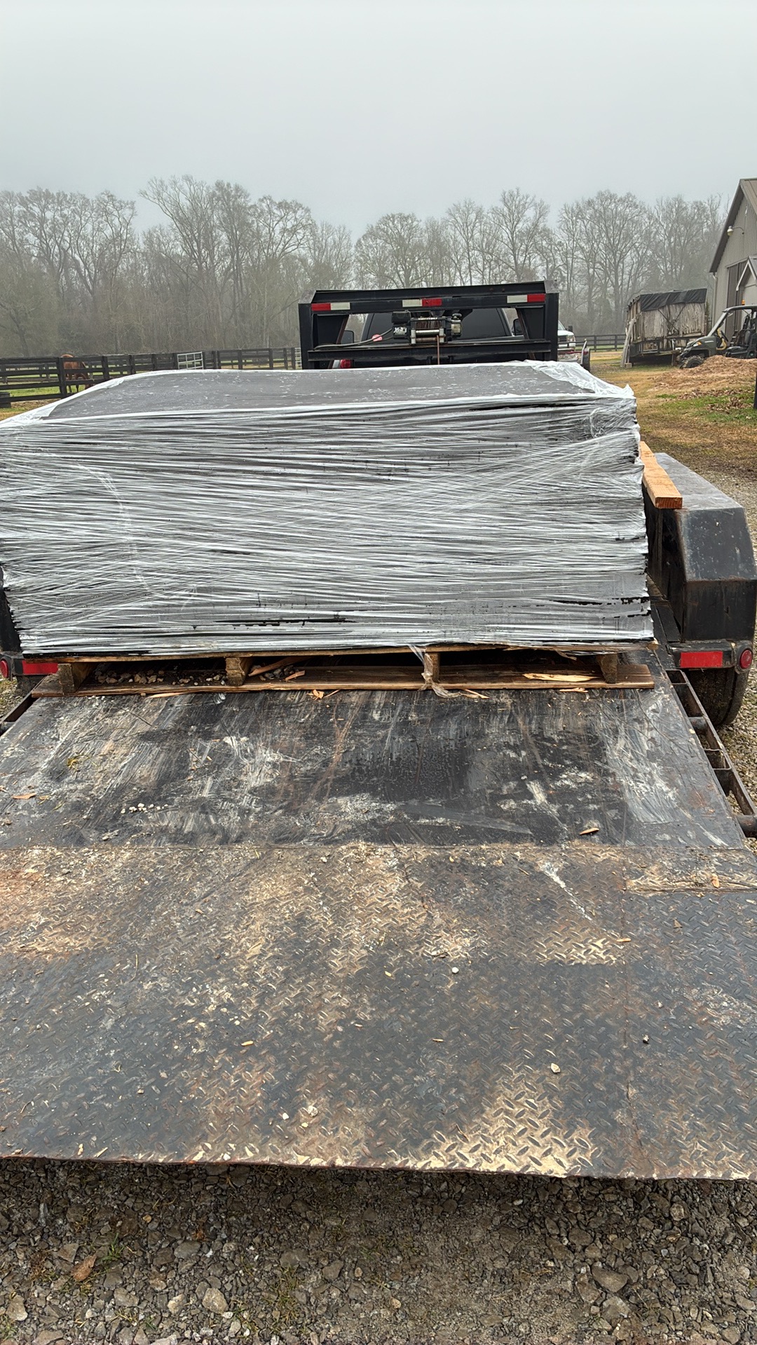 Wrapped pallet of rubber mats ready for delivery